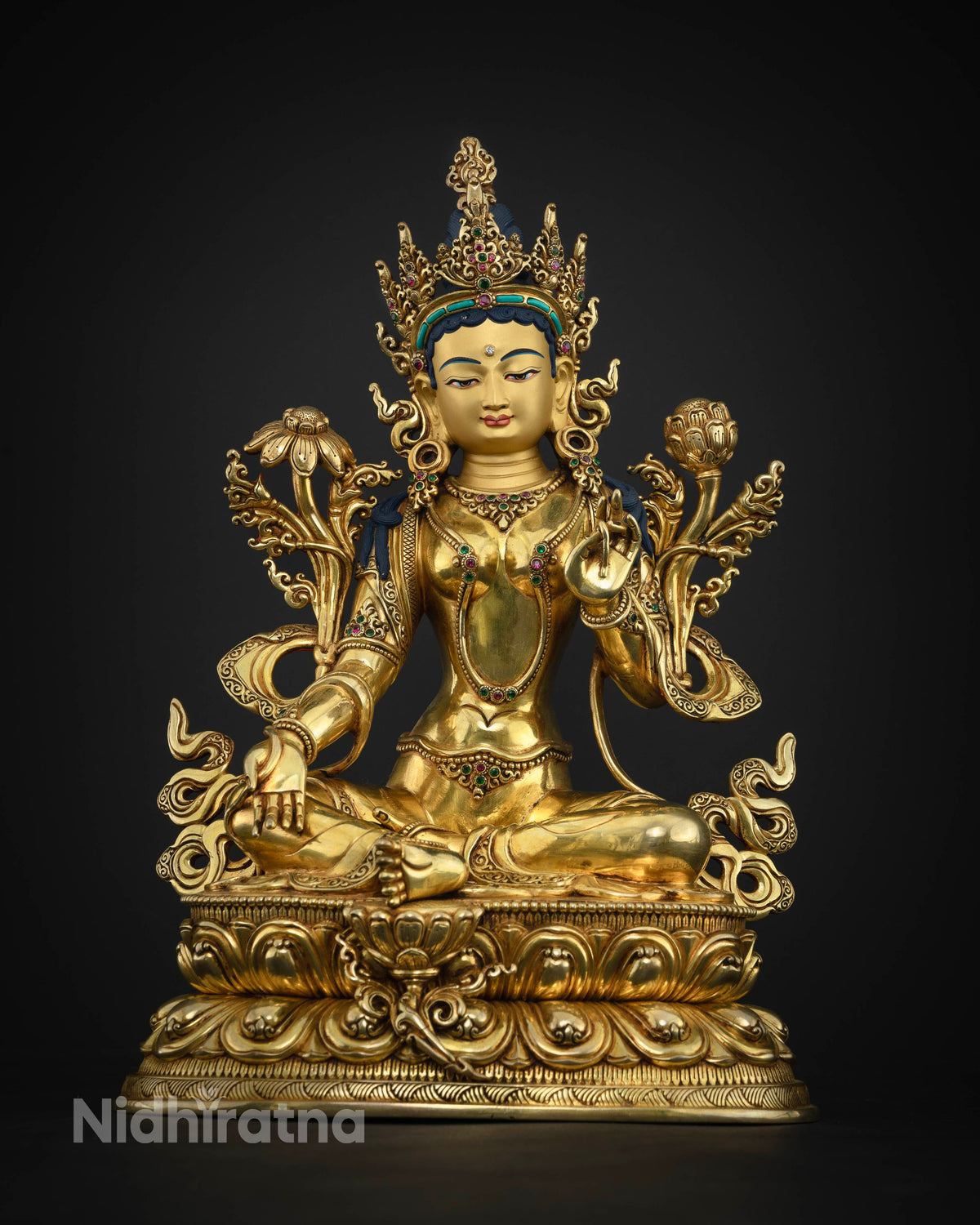 Nepalese Green Tara statue with Utpala lotus stem and traditional Buddhist mudras