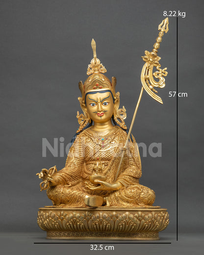 Nepalese Guru Rinpoche statue in gold fire-gilded copper, front view with vajra and khatvanga