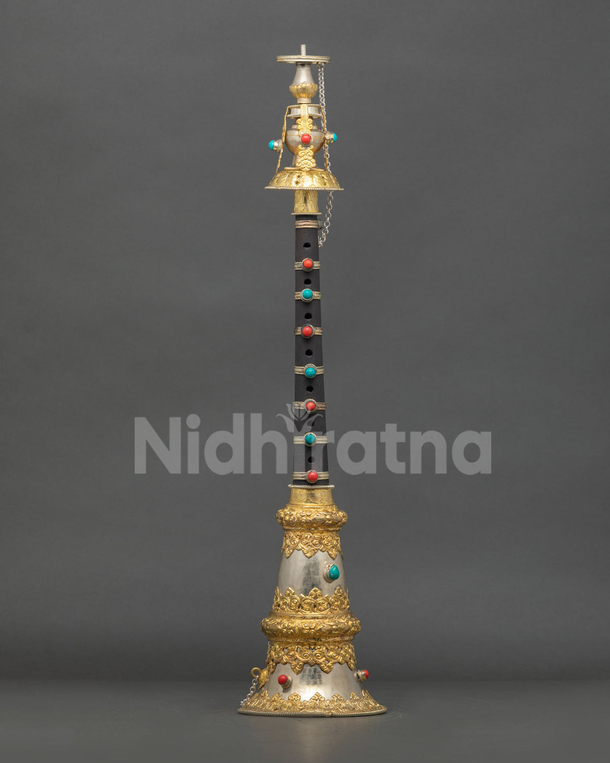 Nepalese Gyaling ritual instrument adorned with coral and turquoise stones