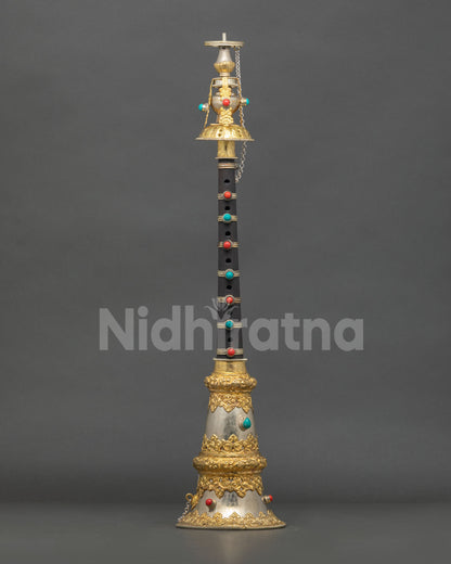 Nepalese Gyaling ritual instrument adorned with coral and turquoise stones