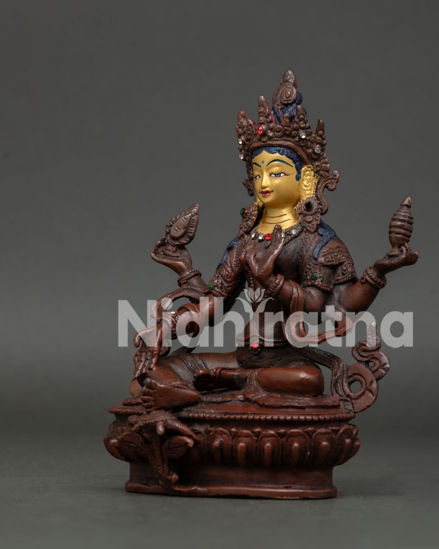 Nepalese Laxmi deity sculpture showing Varada and Abhaya Mudra blessing gestures.