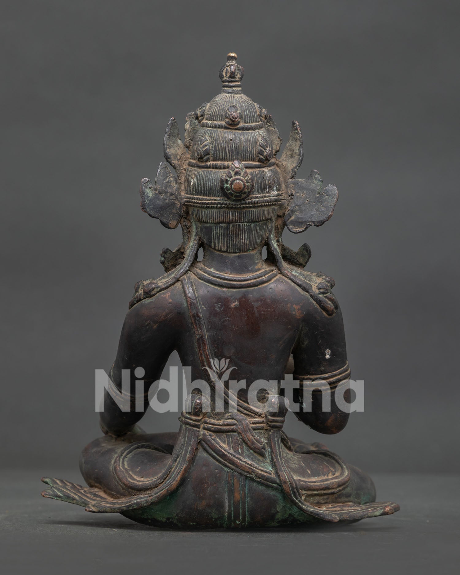 Nepalese Lokeshvara Buddhist statue with oxidized copper finish for meditation altar.