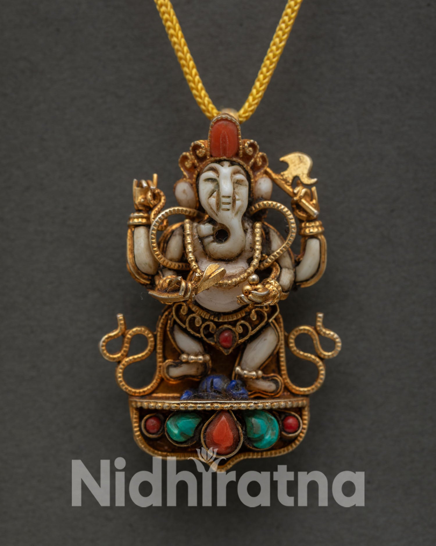 Nepalese Lord Ganesha Locket with White Stone Gold Plated Finish and Sacred Himalayan Design
