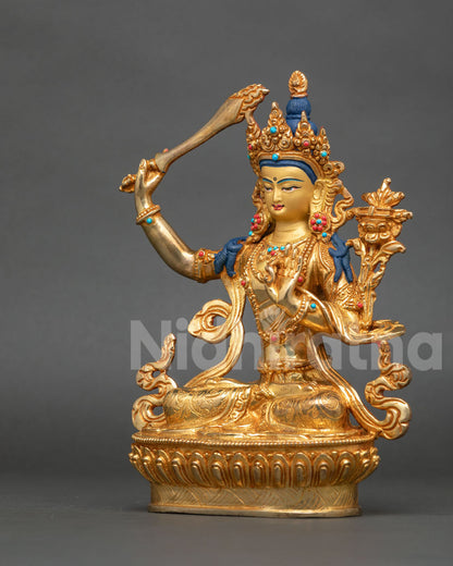 Nepalese Manjushri Statue seated on lotus pedestal with five jeweled crown