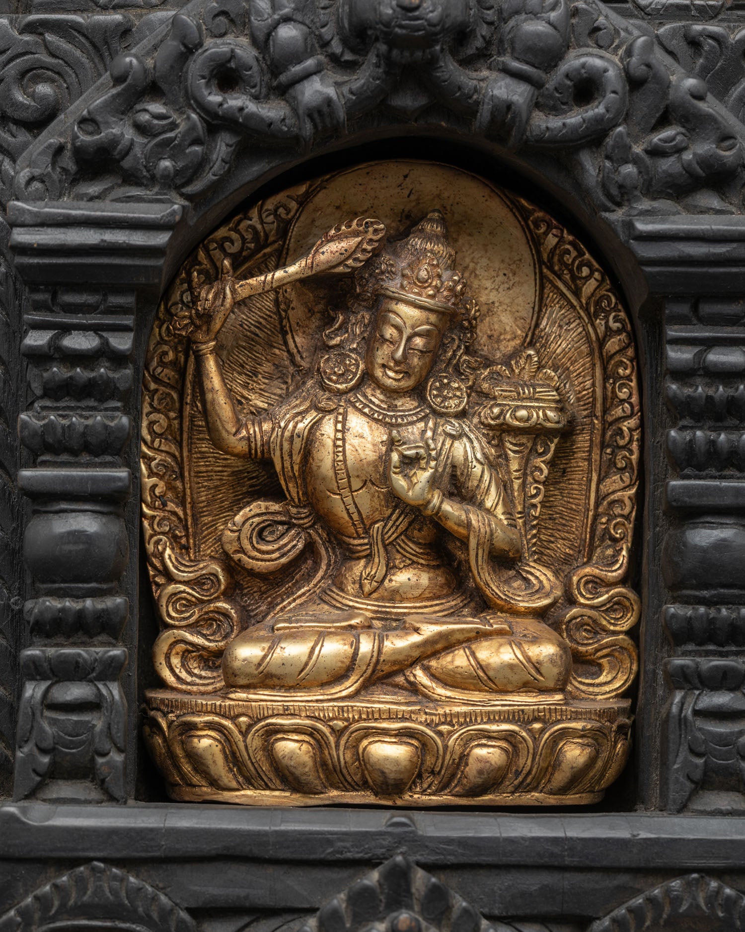 Nepalese Manjushri wall shrine handcrafted from wood and copper