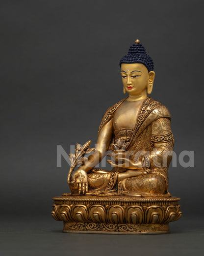 Nepalese Medicine Buddha sculpture with gold gilding, myrobalan plant and lotus pedestal.