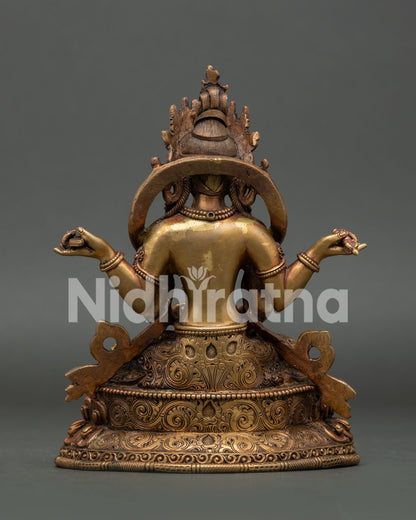 Nepalese Prajnaparamita statue with intricate robe and floral garment.