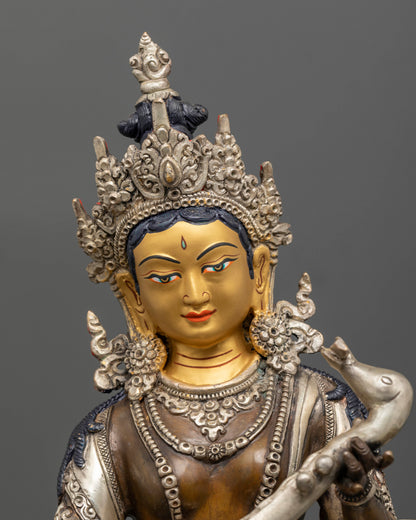 Nepalese Saraswati sculpture holding veena, featuring oxidized copper and traditional lost wax casting
