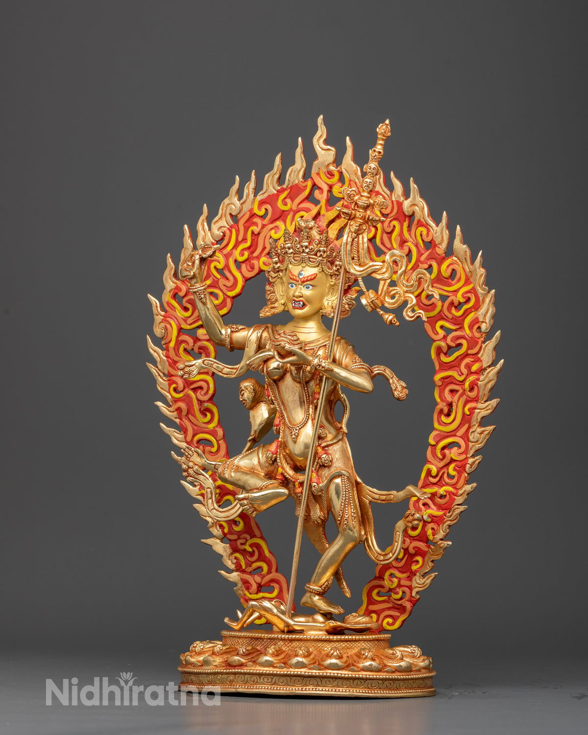 Nepalese Troma Nagmo Dakini statue with trident and intricate traditional metalwork details