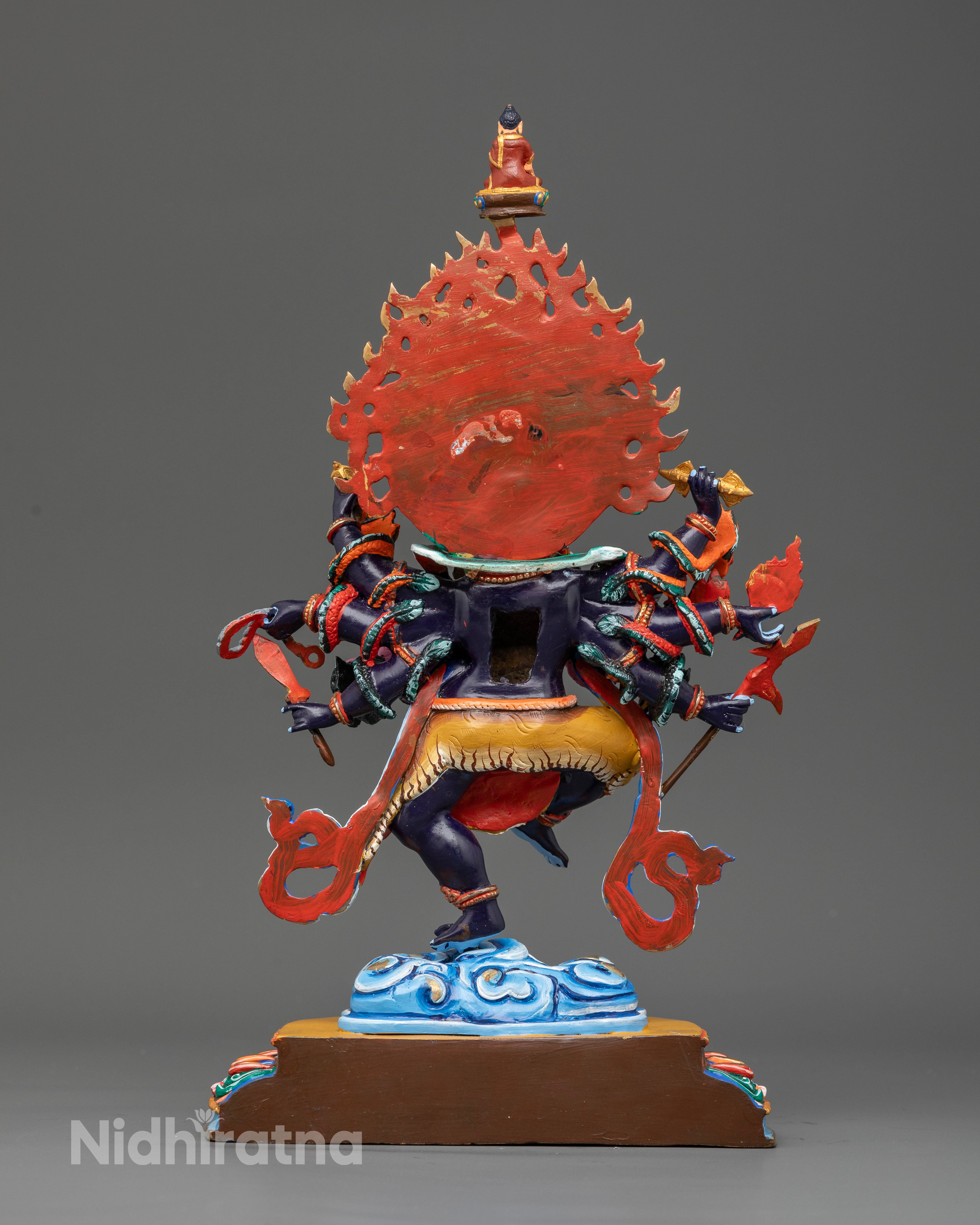Nepalese Ucchusma Buddhist statue with sacred ritual implements.