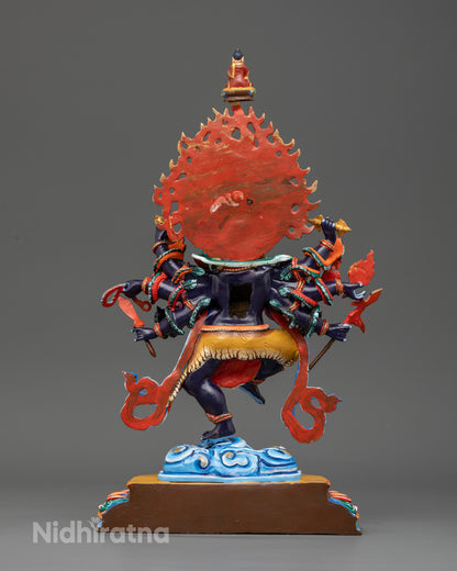 Nepalese Ucchusma Buddhist statue with sacred ritual implements.