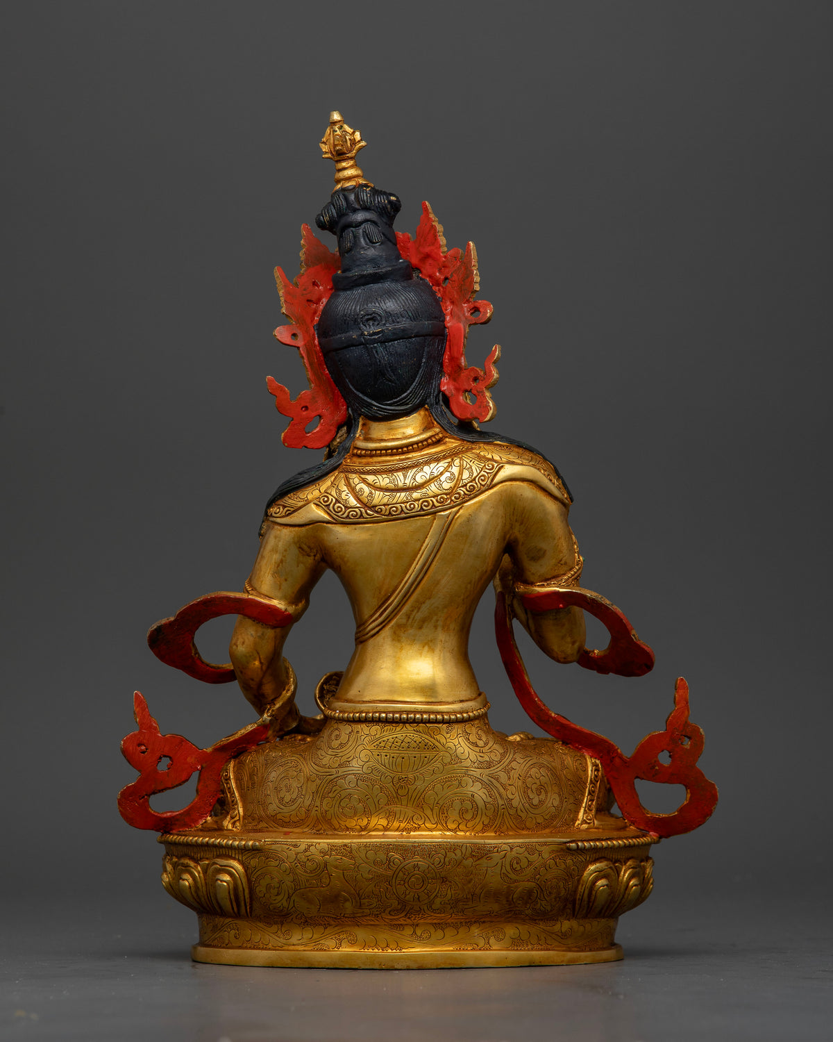 Nepalese Vajrasattva Buddhist statue with gold-painted face and ornate sacred robes