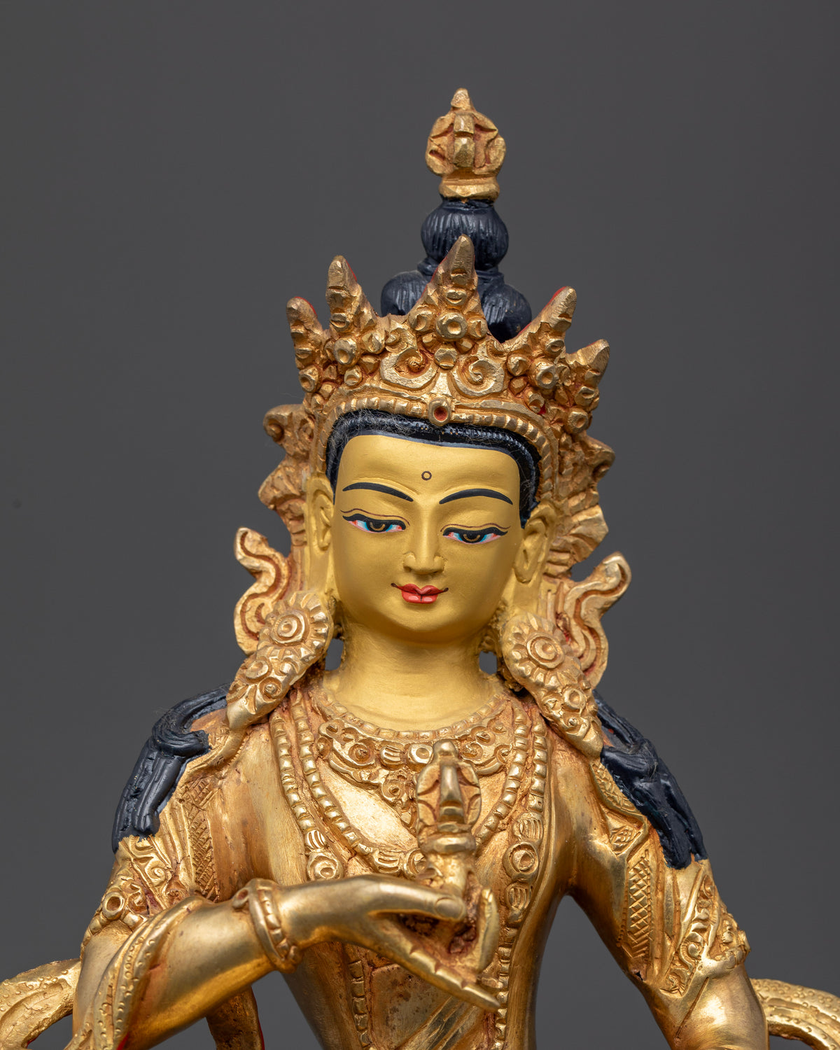 Nepalese Vajrasattva statue with 24K gold painted face and flowing robe.