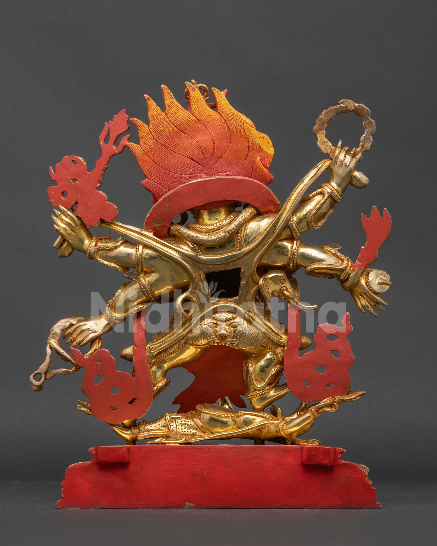 Nepalese Vajrayana Six-Armed Mahakala statue standing on an ornate lotus pedestal