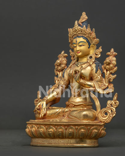 Nepalese White Tara statue with carved floral motifs and elegant ornaments