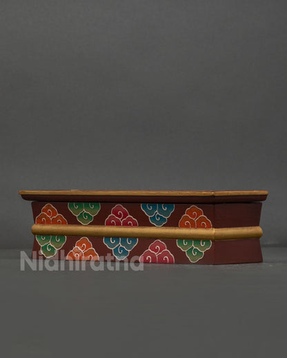 Nepalese wooden incense burner with vibrant hand painted cloud artwork