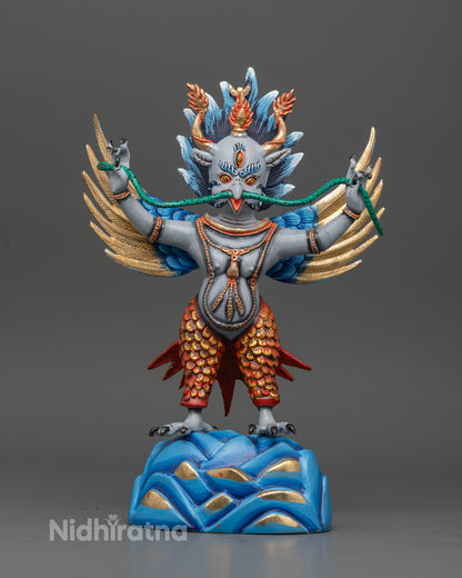 Nepali garuda statue with powerful talons and dynamic standing posture.