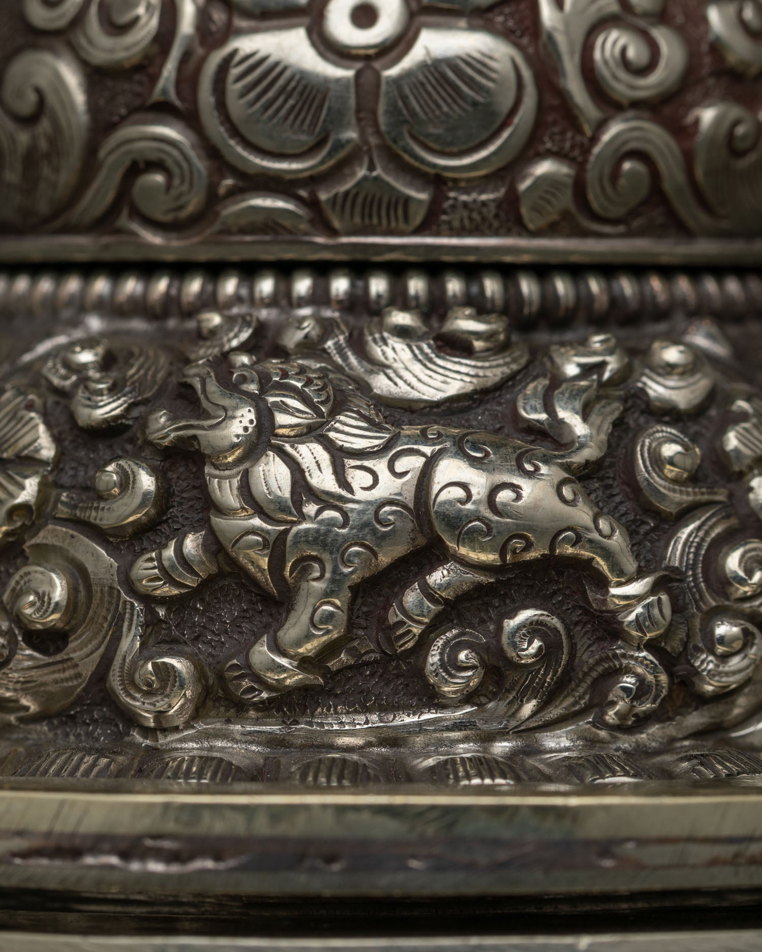 Neshi Rice Pot with intricate mythical Buddhist creature carvings
