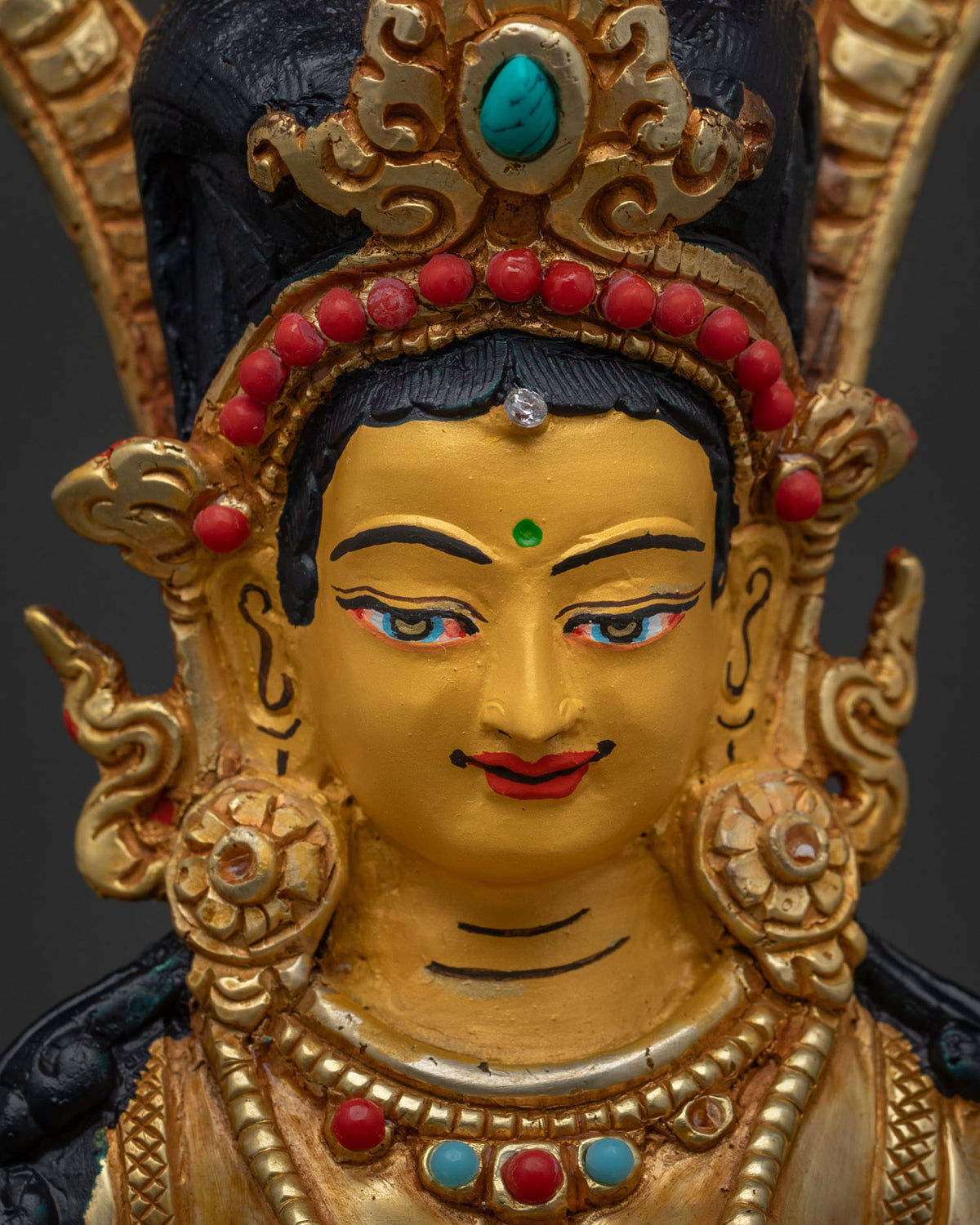 Newari artisan Naga Kanya sculpture from Patan Nepal with semi-precious stones.