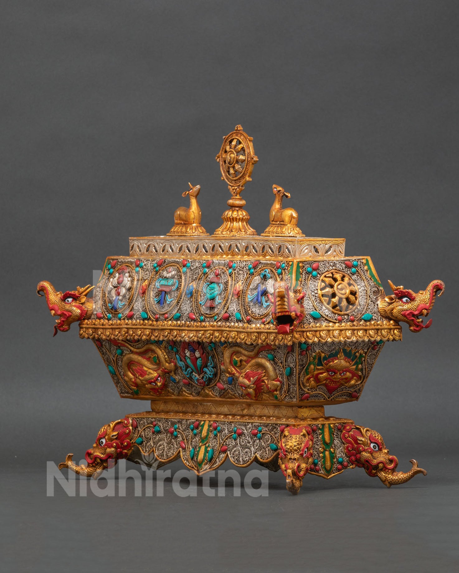 Newari Buddhist incense burner from Patan Nepal with Dharma Wheel and deer lid motif.