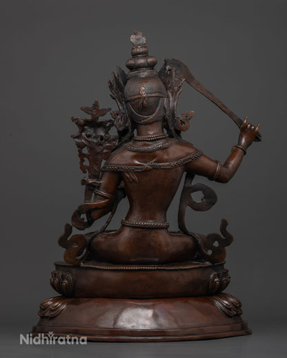 Newari crafted Manjushri statue featuring intricate copper details for a Buddhist altar, meditation room, or sacred shrine.
