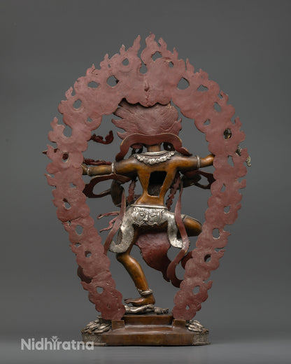 Newari handcrafted Kurukulla statue showcasing intricate carvings and a large silver plated halo.