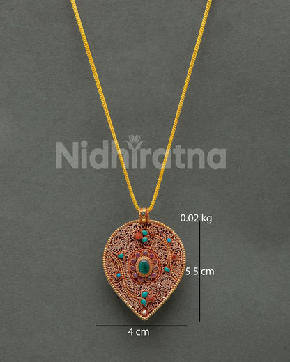 Newari Leaf Locket featuring intricate gold-plated filigree and semi-precious stone accents