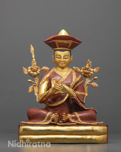 nyamme sherab gyaltsen statue front view with gold-gilded face and dharmachakra mudra