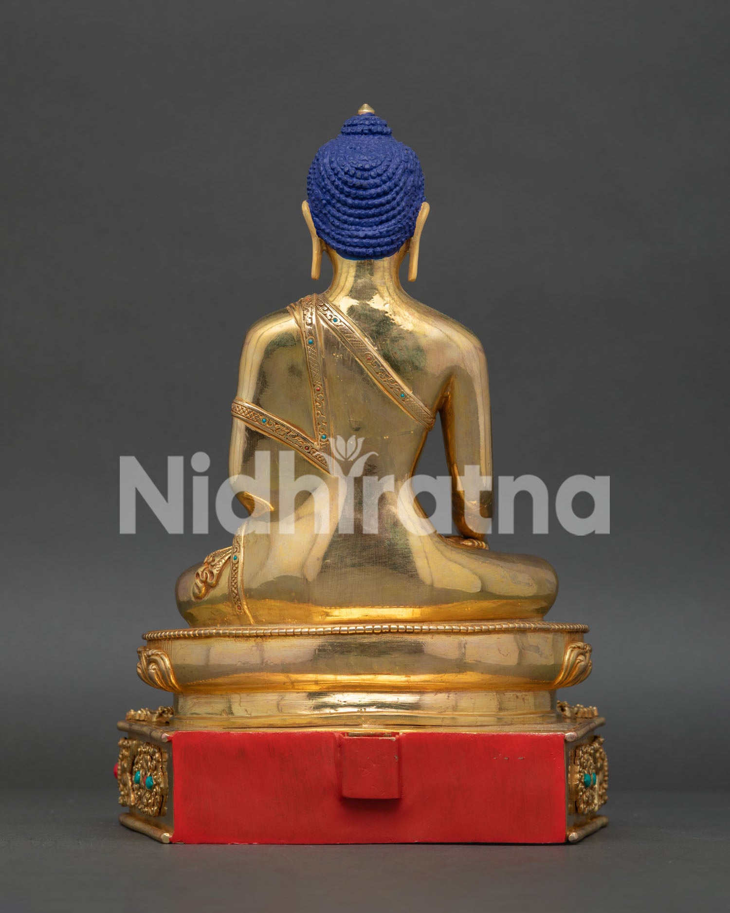 Ornate carved throne of Buddha Shakyamuni statue with lotus pedestal