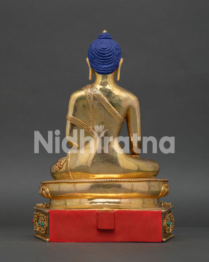 Ornate carved throne of Buddha Shakyamuni statue with lotus pedestal