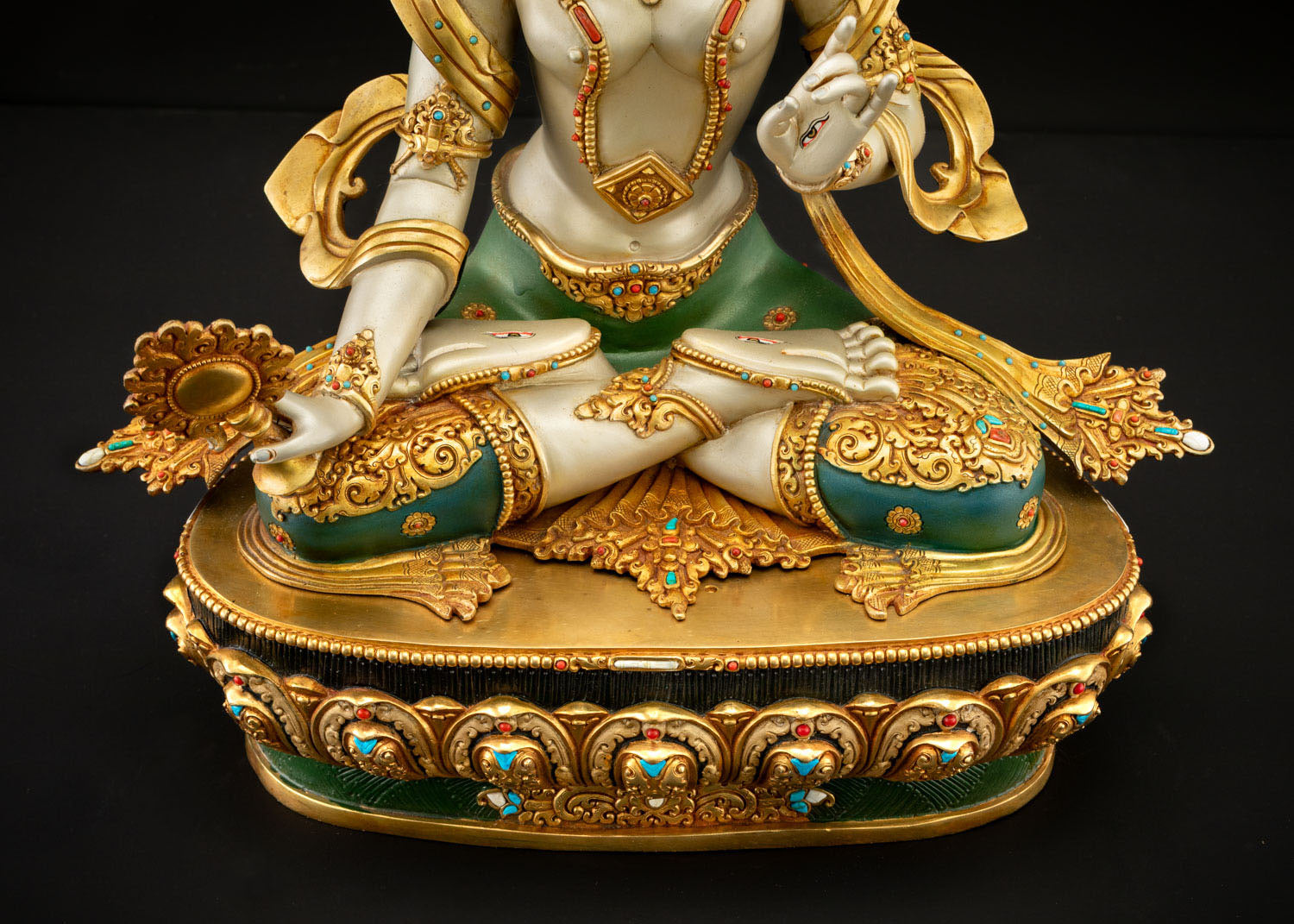 Ornate lotus pedestal base of Dukar Sitatapatra statue with gemstone inlay detail Nepal