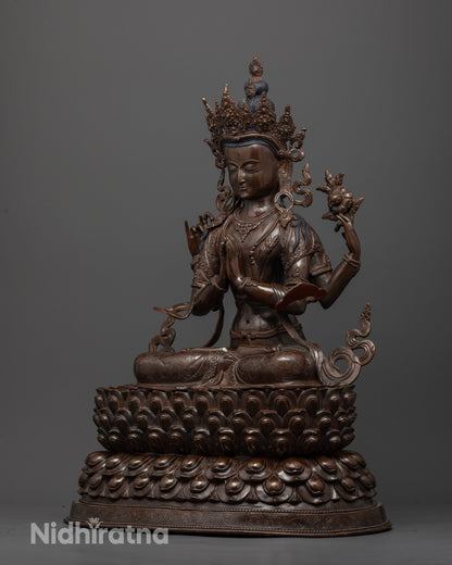 Oxidized Chenrezig Buddhist statue featuring intricate ornamental carvings, serene facial expression, and finely sculpted jewelry