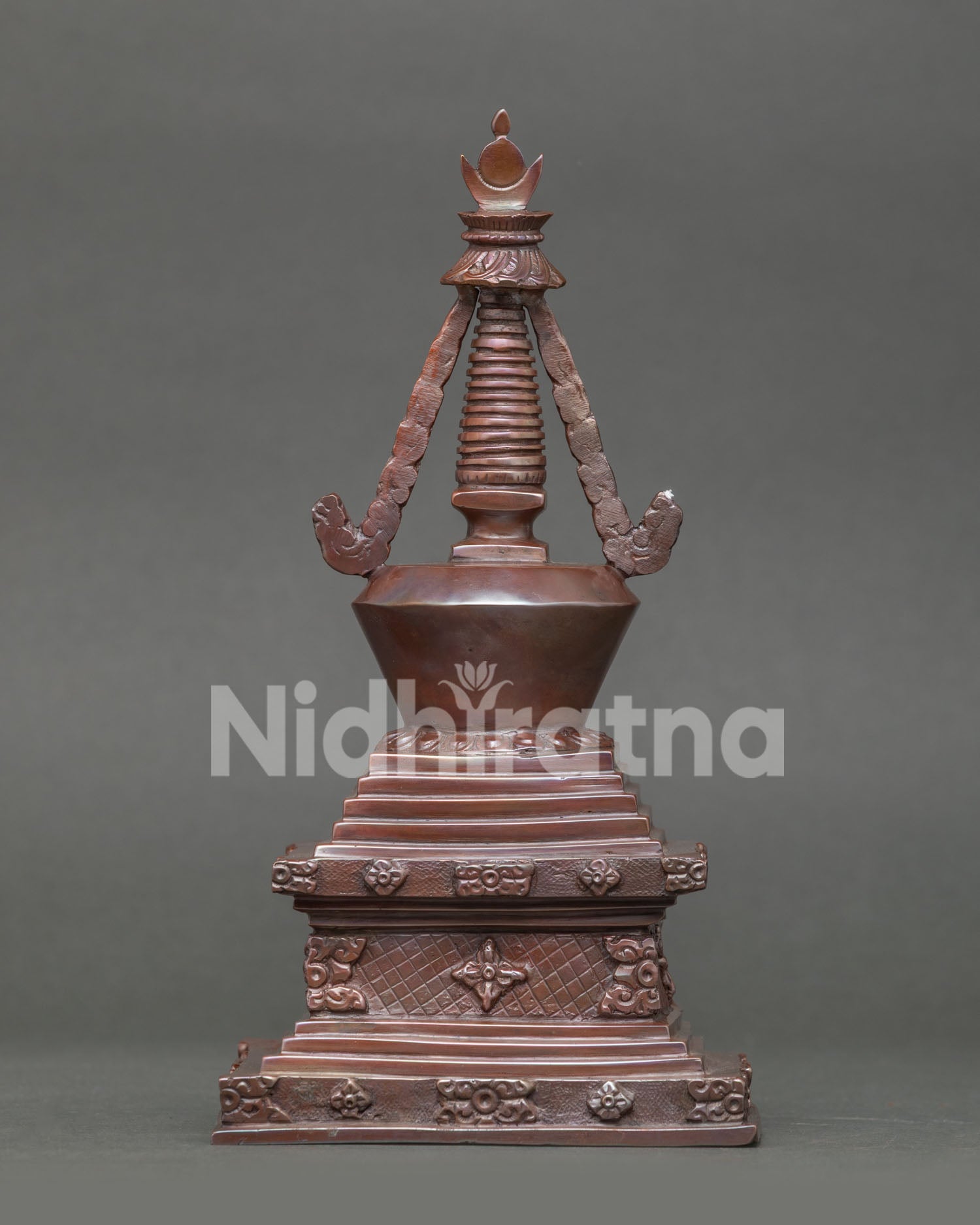 Oxidized copper Buddha Stupa symbolizing spiritual awakening and enlightenment