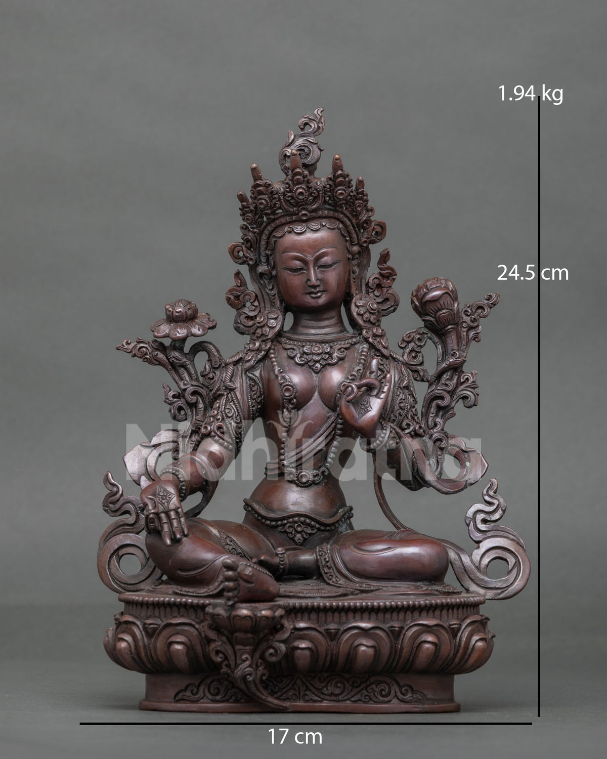 Oxidized copper Green Tara Buddhist statue seated in Lalitasana posture on a lotus pedestal