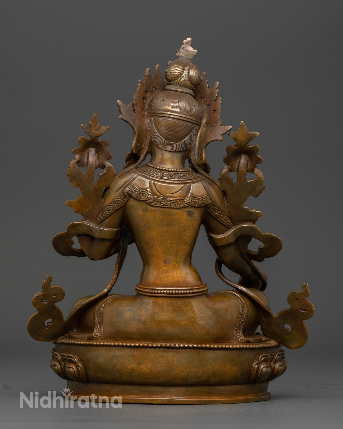 Oxidized copper Green Tara statue for Buddhist altars, meditation spaces, and spiritual practice.