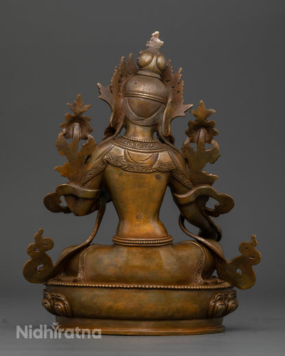 Oxidized copper Green Tara statue for Buddhist altars, meditation spaces, and spiritual practice.