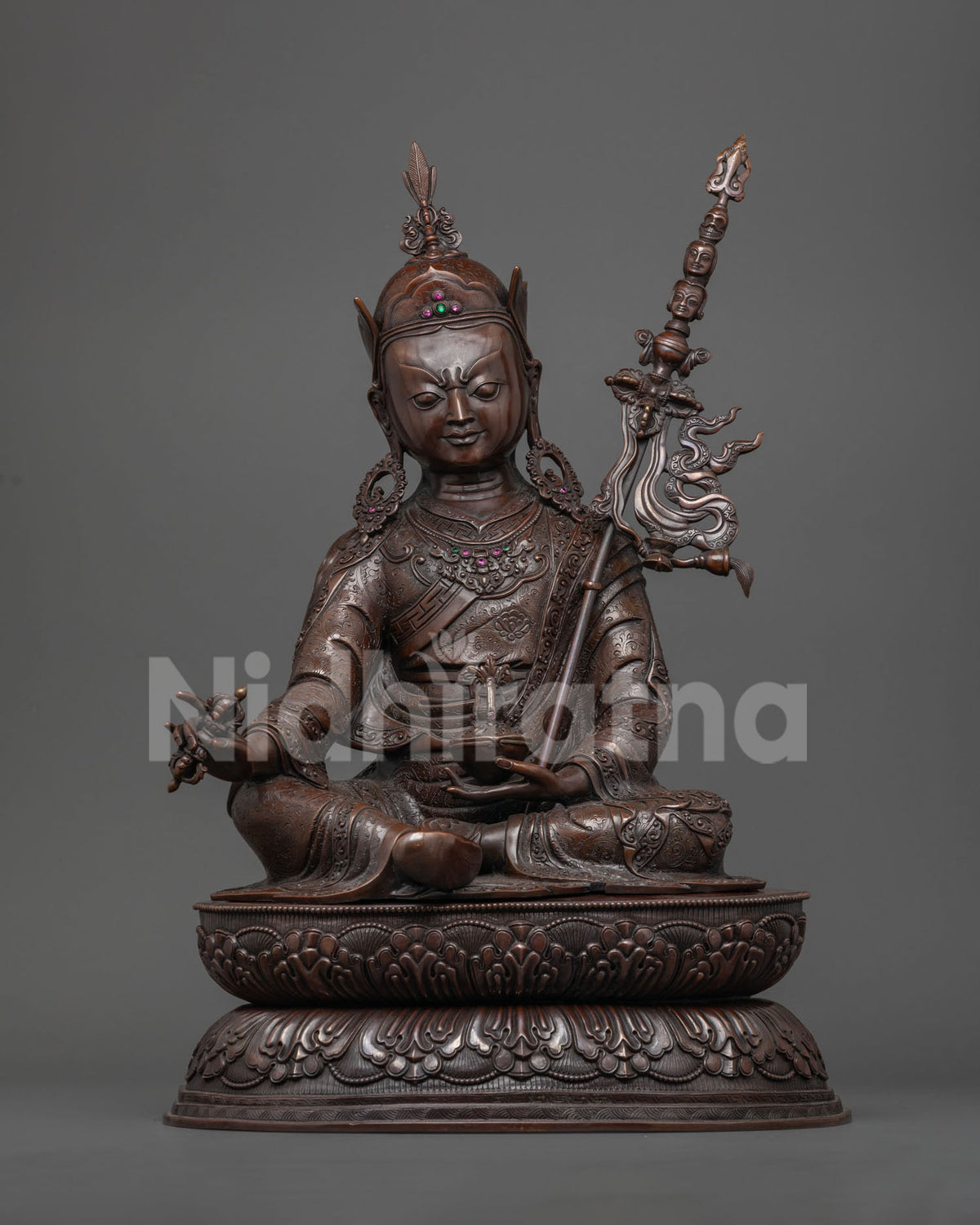 Oxidized copper Guru Rinpoche statue seated on double lotus base, handcrafted in Nepal