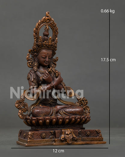 Oxidized Copper Vajradhara Statue Seated on Lotus Pedestal.