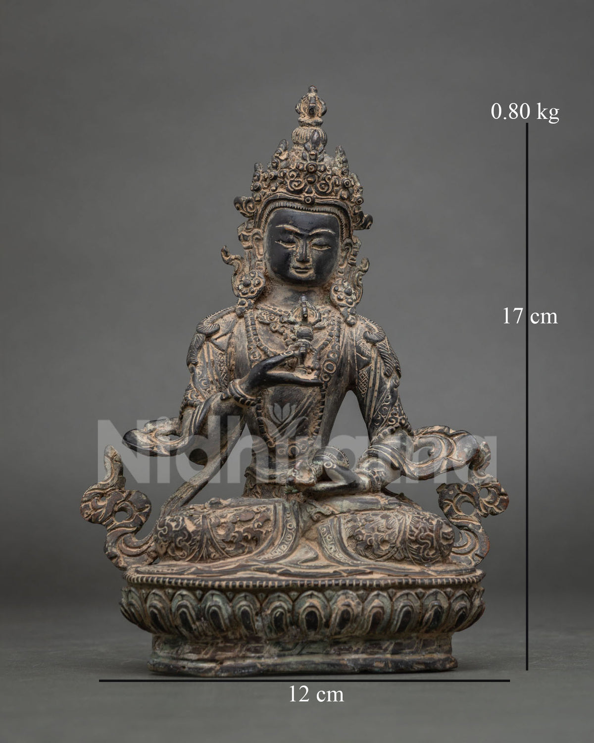 Oxidized Copper Vajrasattva Statue front view seated on detailed lotus pedestal holding vajra and bell