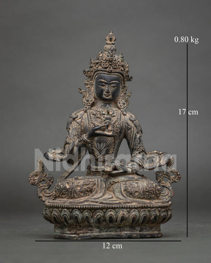 Oxidized Copper Vajrasattva Statue front view seated on detailed lotus pedestal holding vajra and bell