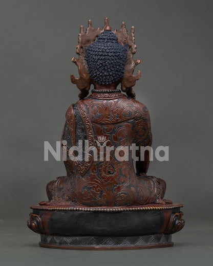 Oxidized Crowned Shakyamuni Buddha statue with Newari craftsmanship and sacred symbolism.