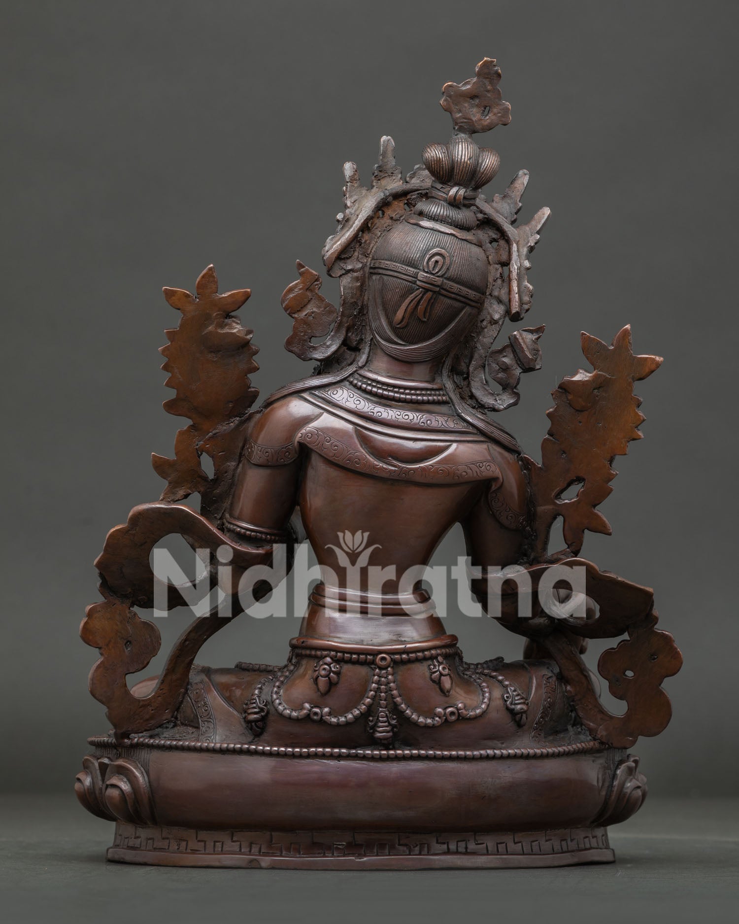 Oxidized Green Tara Statue with lotus pedestal and traditional Nepalese Buddhist artistry.