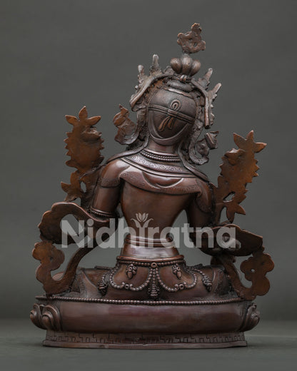 Oxidized Green Tara Statue with lotus pedestal and traditional Nepalese Buddhist artistry.