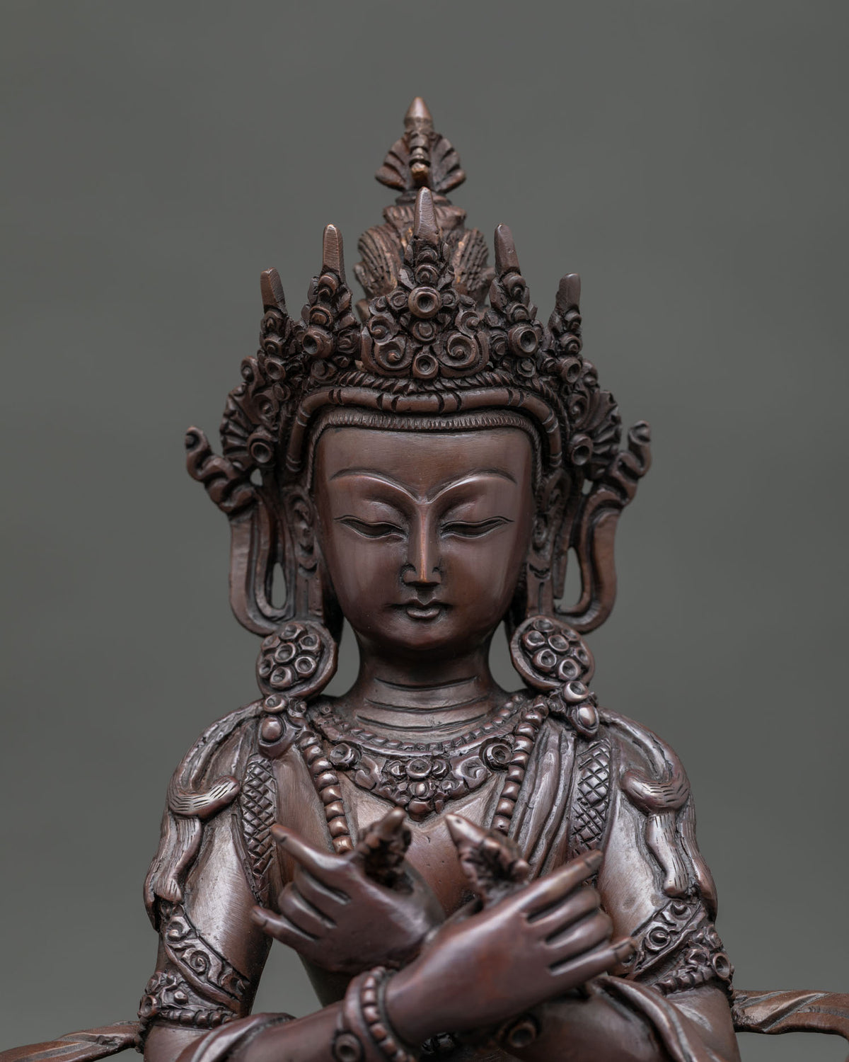 Oxidized Vajradhara buddhist statue symbolizing wisdom and compassion.