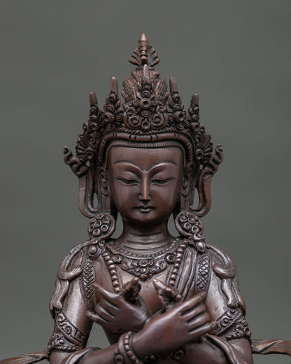 Oxidized Vajradhara buddhist statue symbolizing wisdom and compassion.