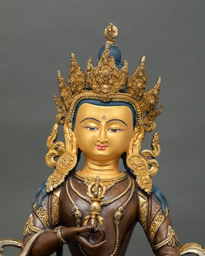 Oxidized Vajrasattva statue close up view handcrafted copper detailing and gold face Nepal