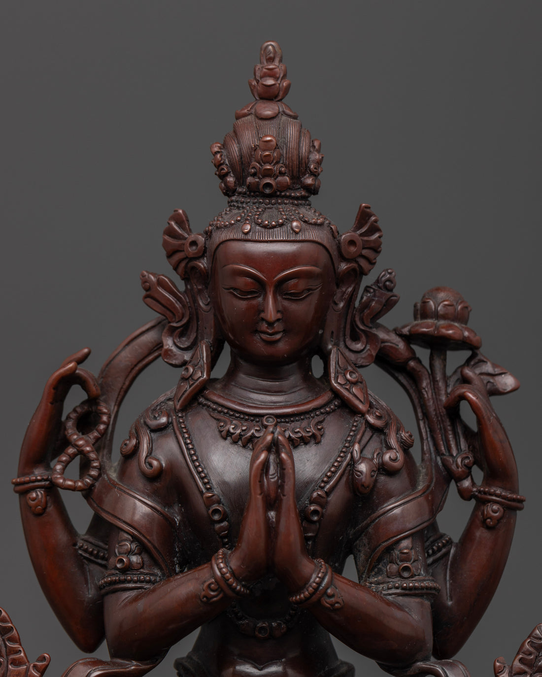 face of beautiful oxidized chenrezig statue