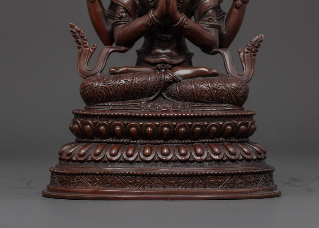 crossed legs in meditation of brown copper oxidized chenrezig statue