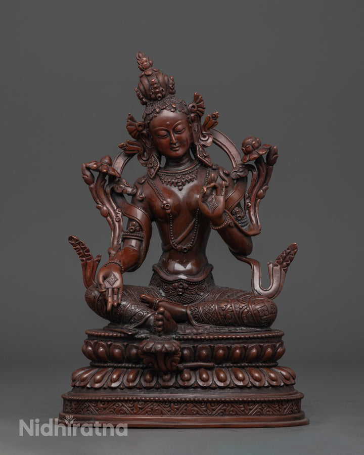 front view of elegantly crafted oxidized green tara statue