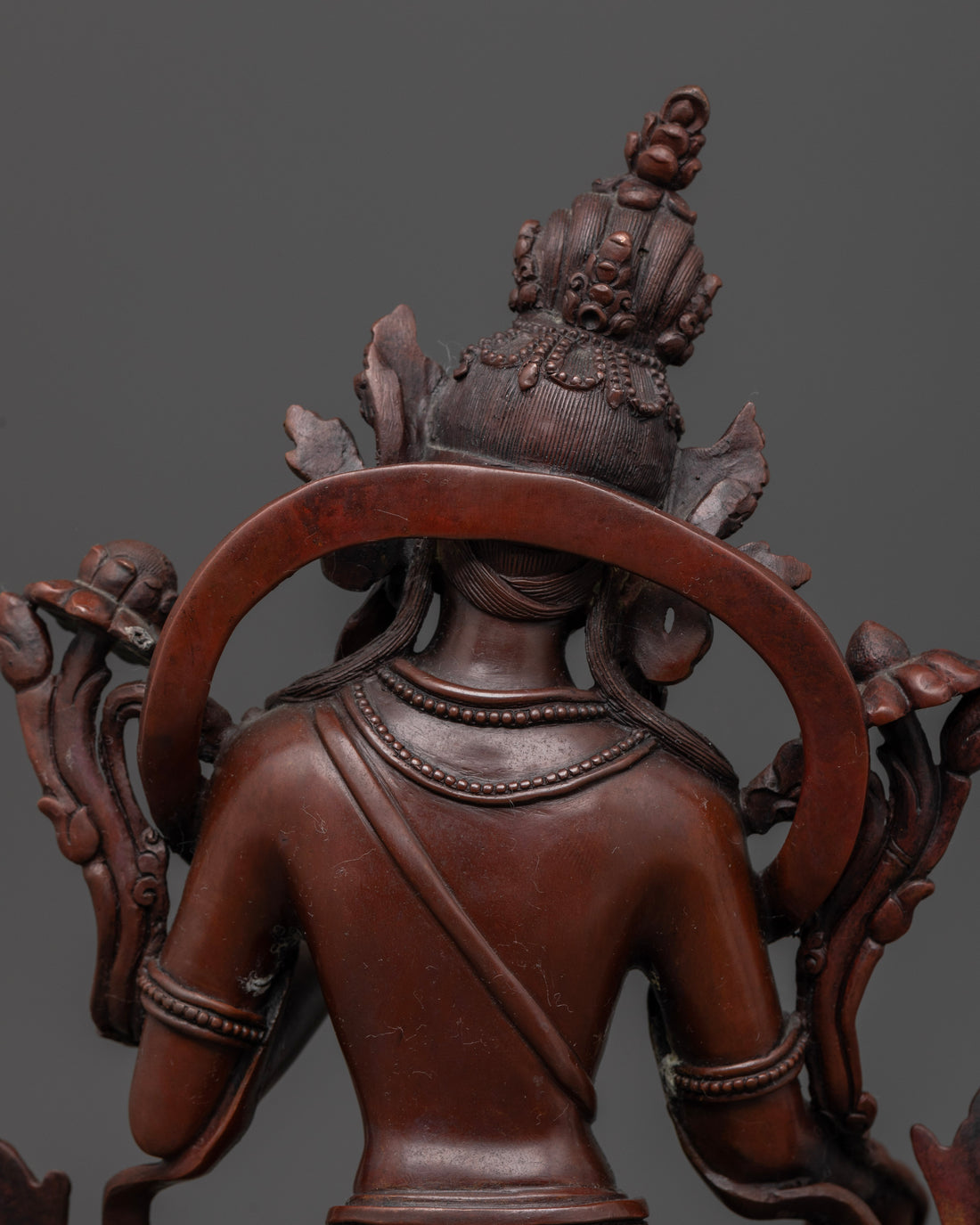 back view of hair of oxidized green tara statue